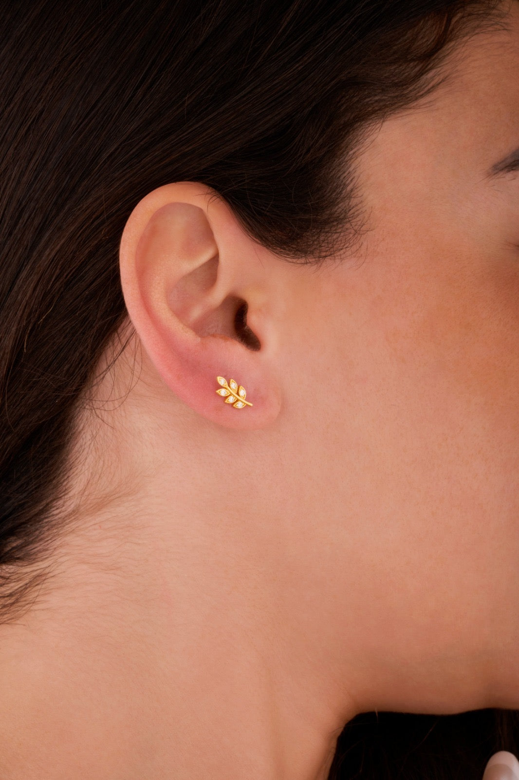 Iris leaf gold ear piercing