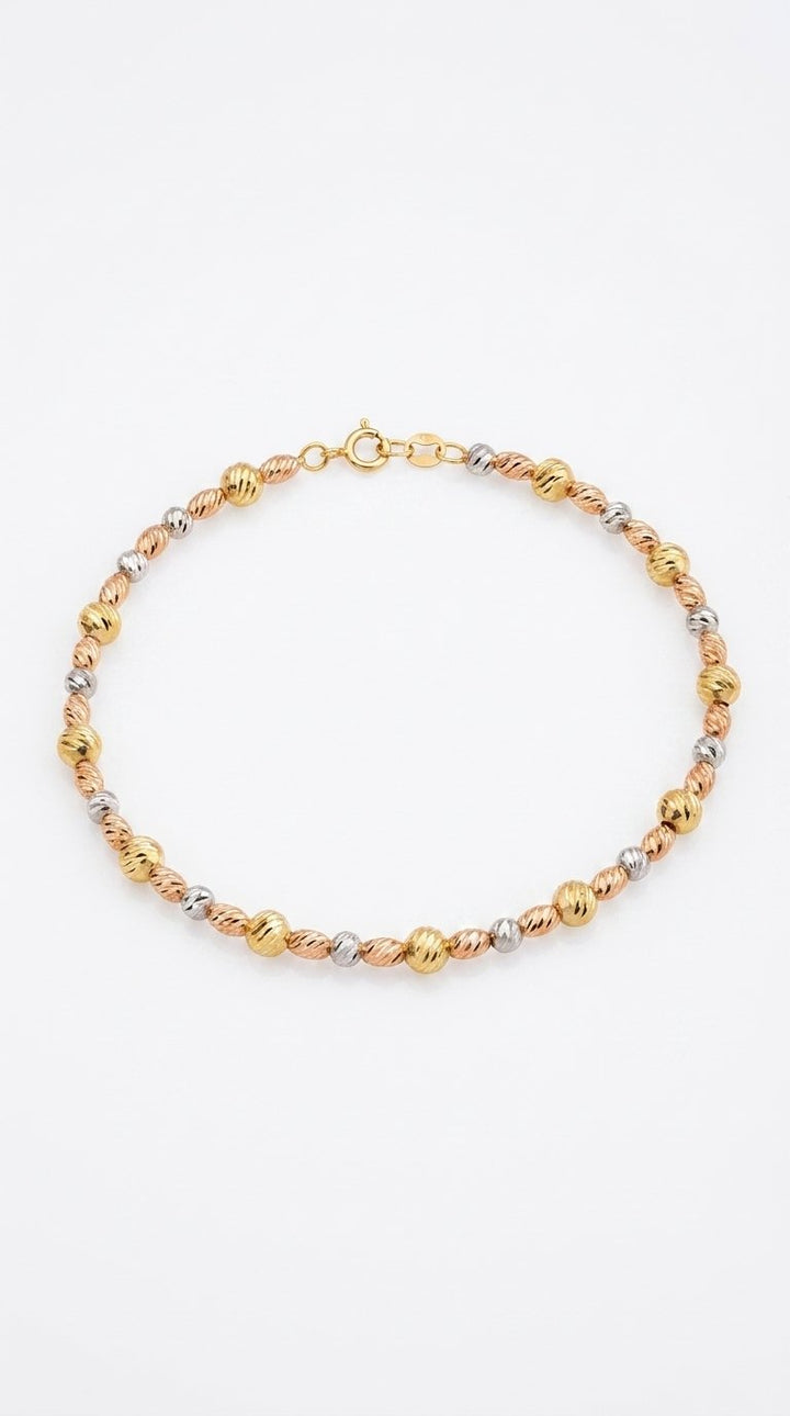 Iris Oval Beads Gold Bangle