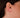 Iris gold ear piercing