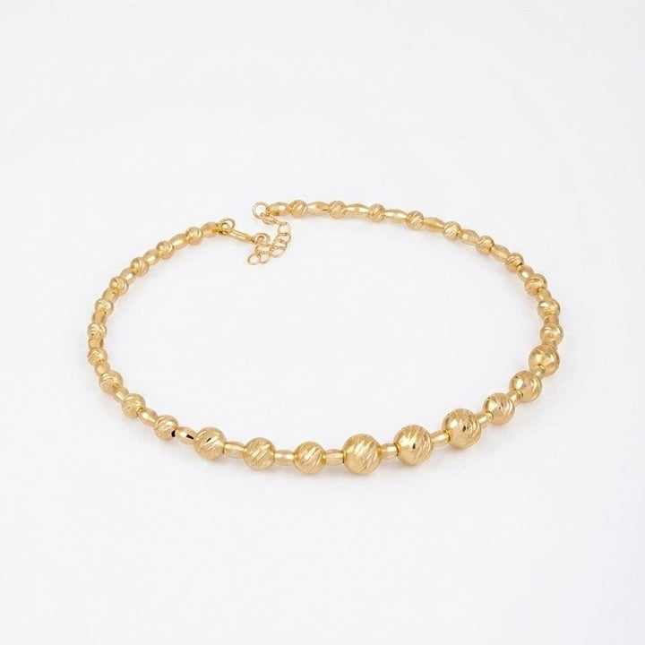 Iris Graduated Beads Gold Bangle