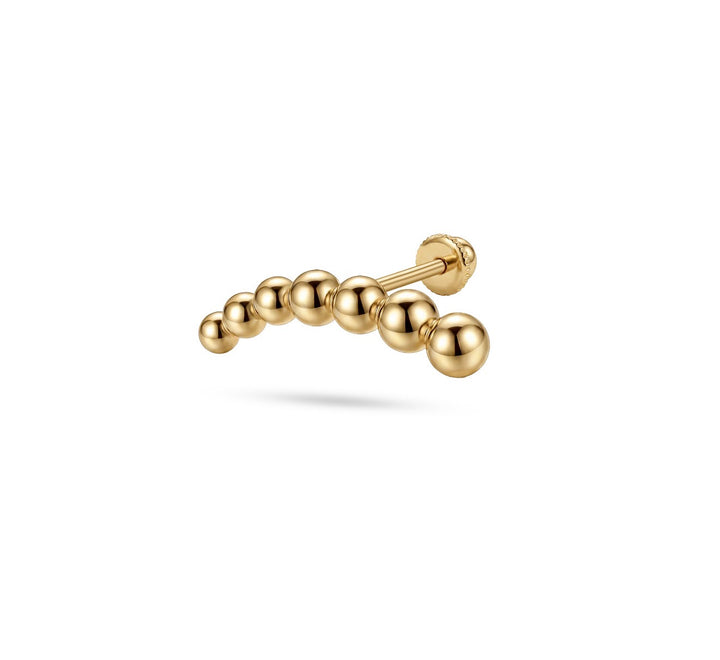 Iris gold ear piercing