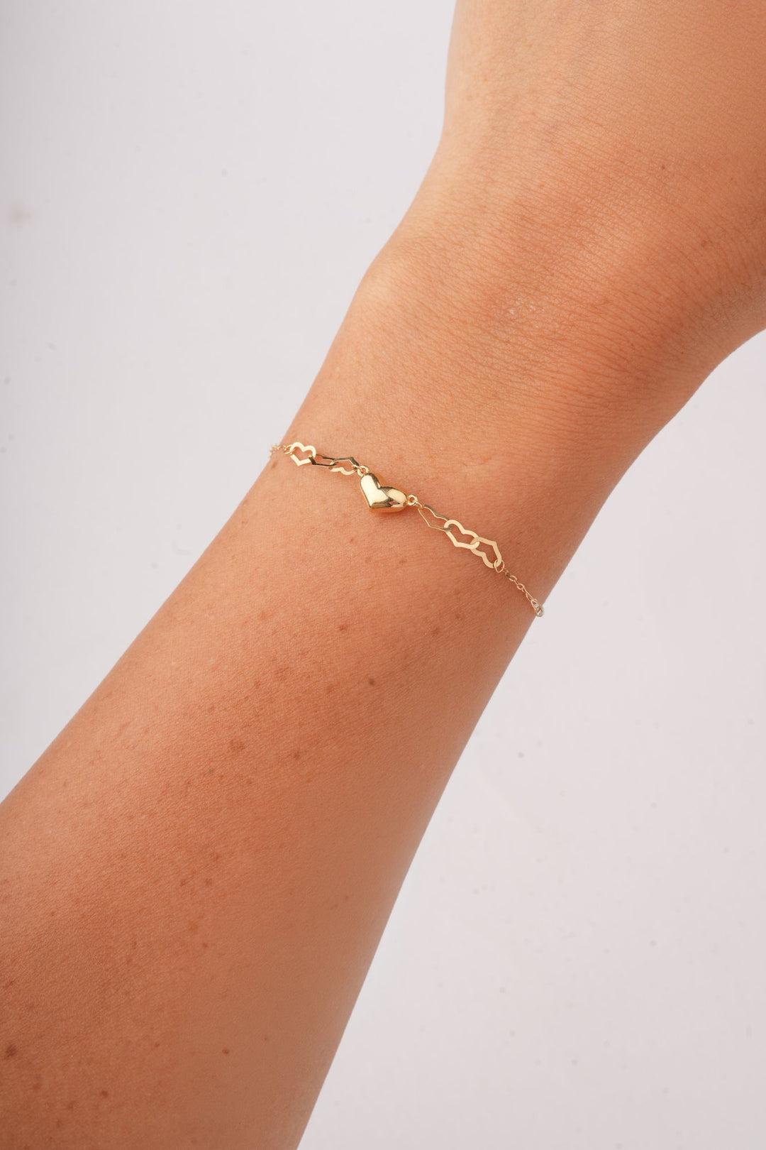 Iris Linked Hearts Gold Bracelet
