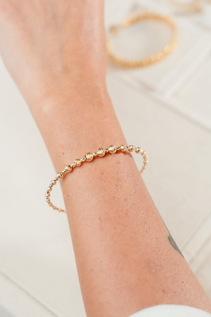 Iris Graduated Beads Gold Bangle