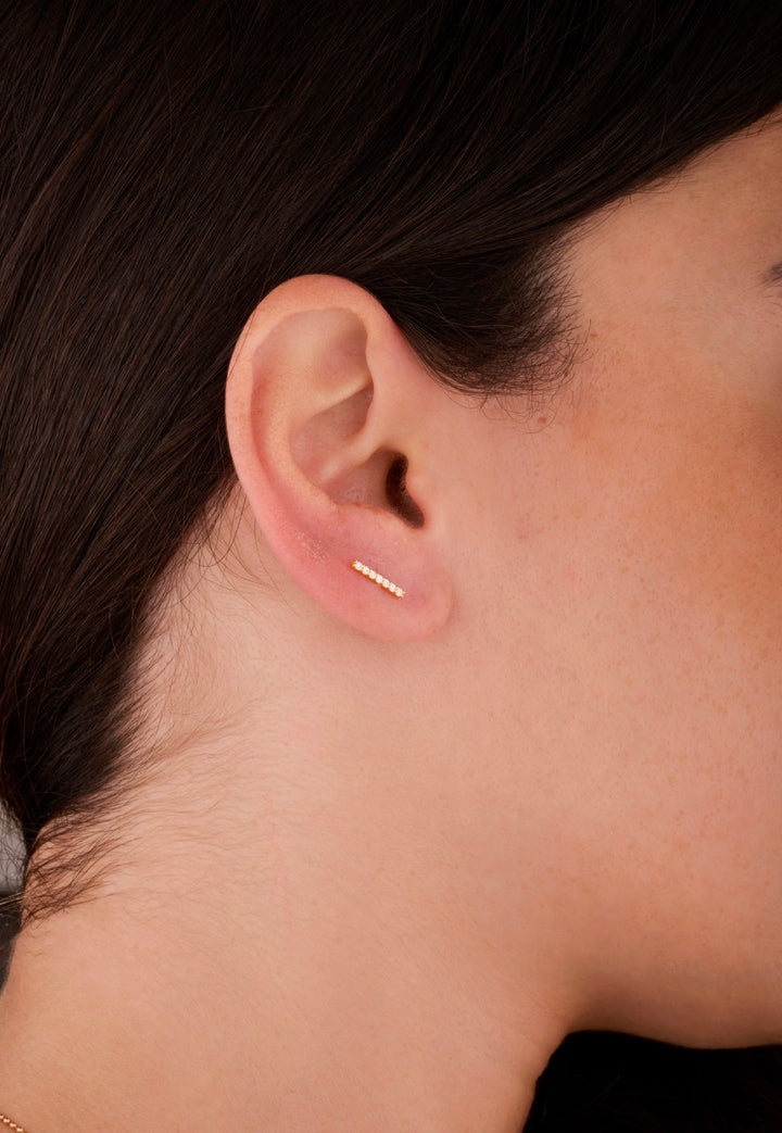Iris straight 7 stones gold ear piercing