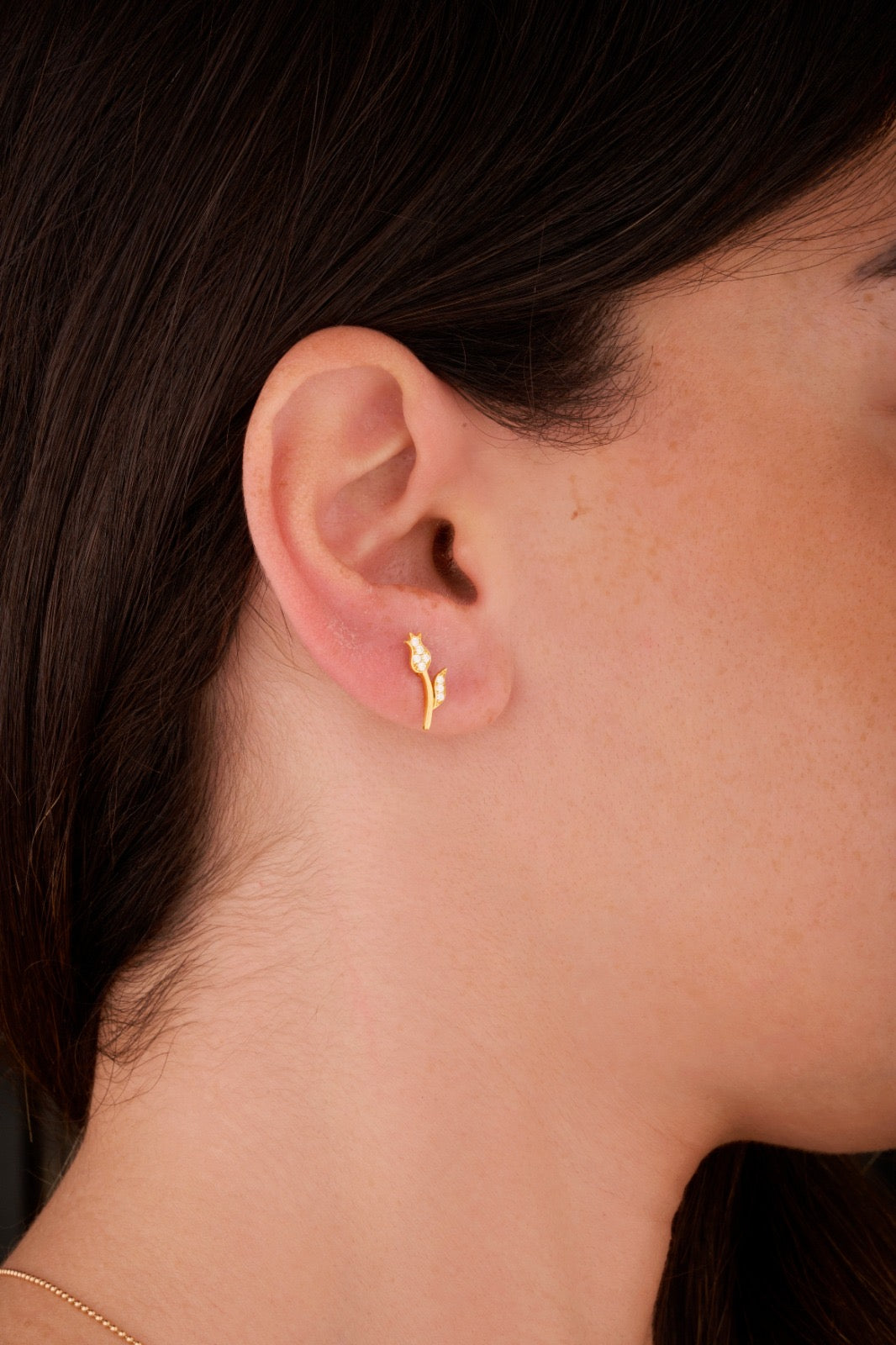 Iris rose gold ear piercing