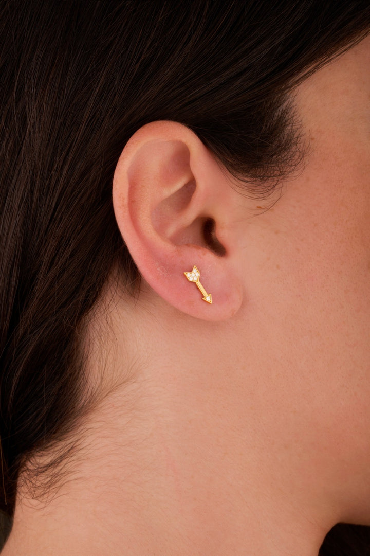 Iris arrow gold ear piercing