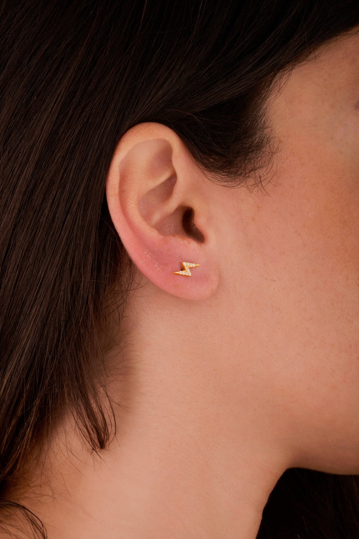 Iris thunder stone gold ear piercing