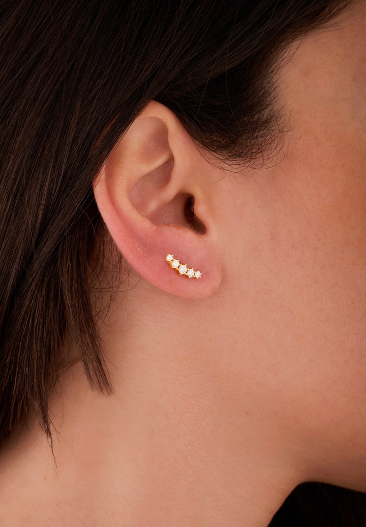 Iris five stones gold ear piercing
