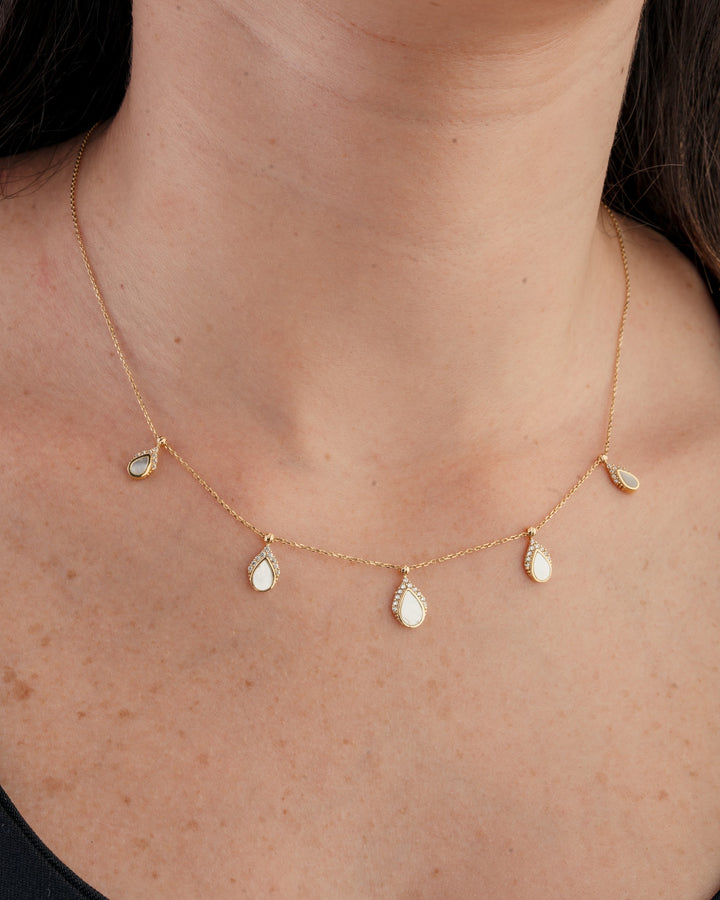 Eclat pares with stones gold necklace